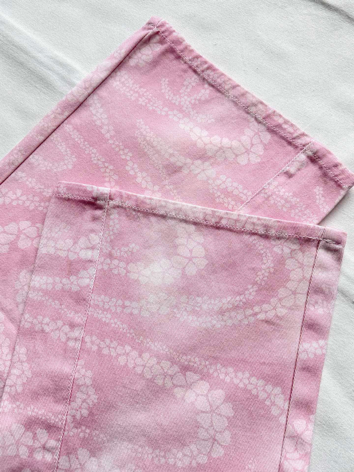 C 25 New Camellia logo positioning print fashion denim pants