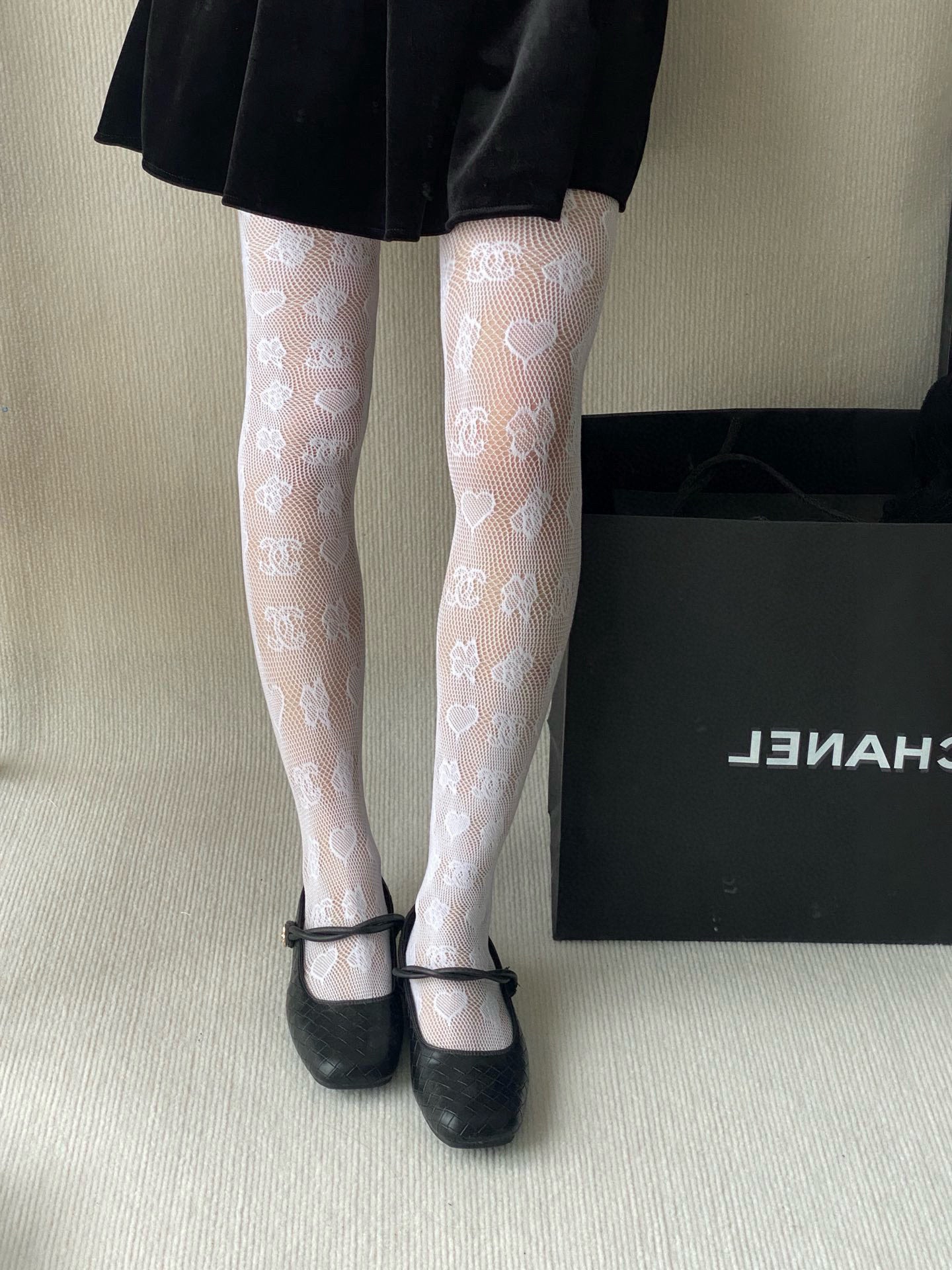C Heart logo fishnet tights
