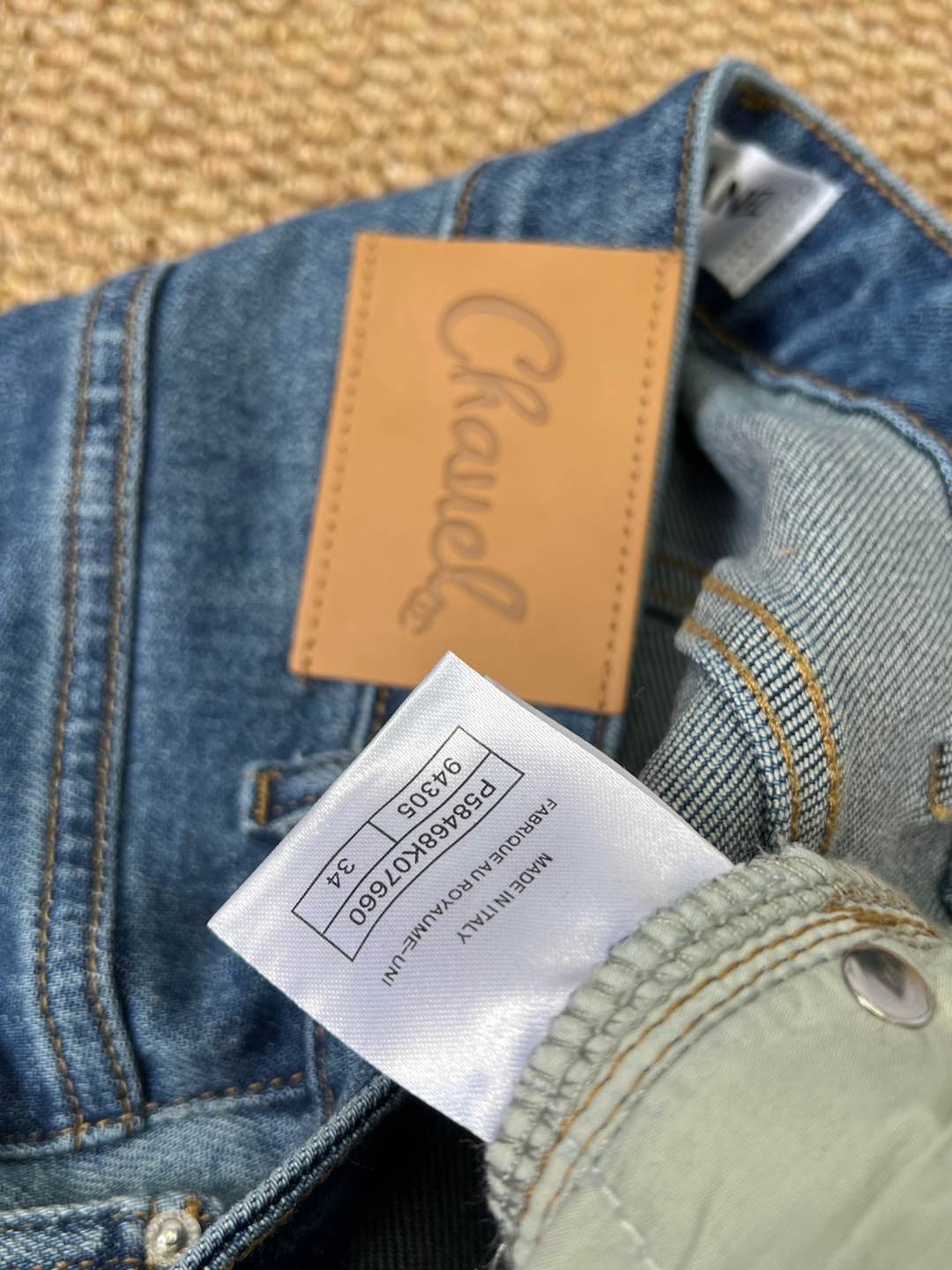 C 25 Laminated lettering stretch straight-leg trousers
