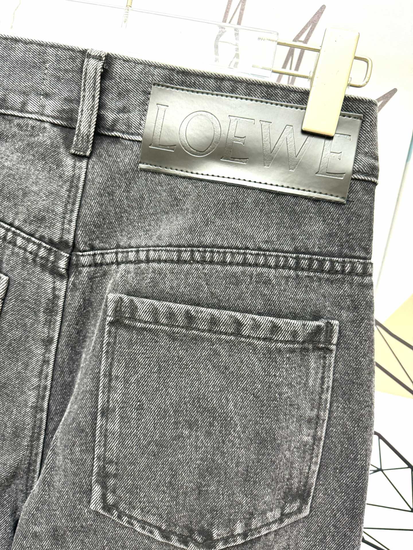 LO 25 Embroidered logo jeans at knee position