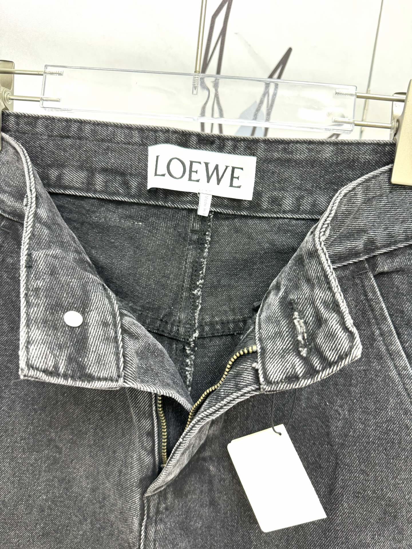 LO 25 Embroidered logo jeans at knee position