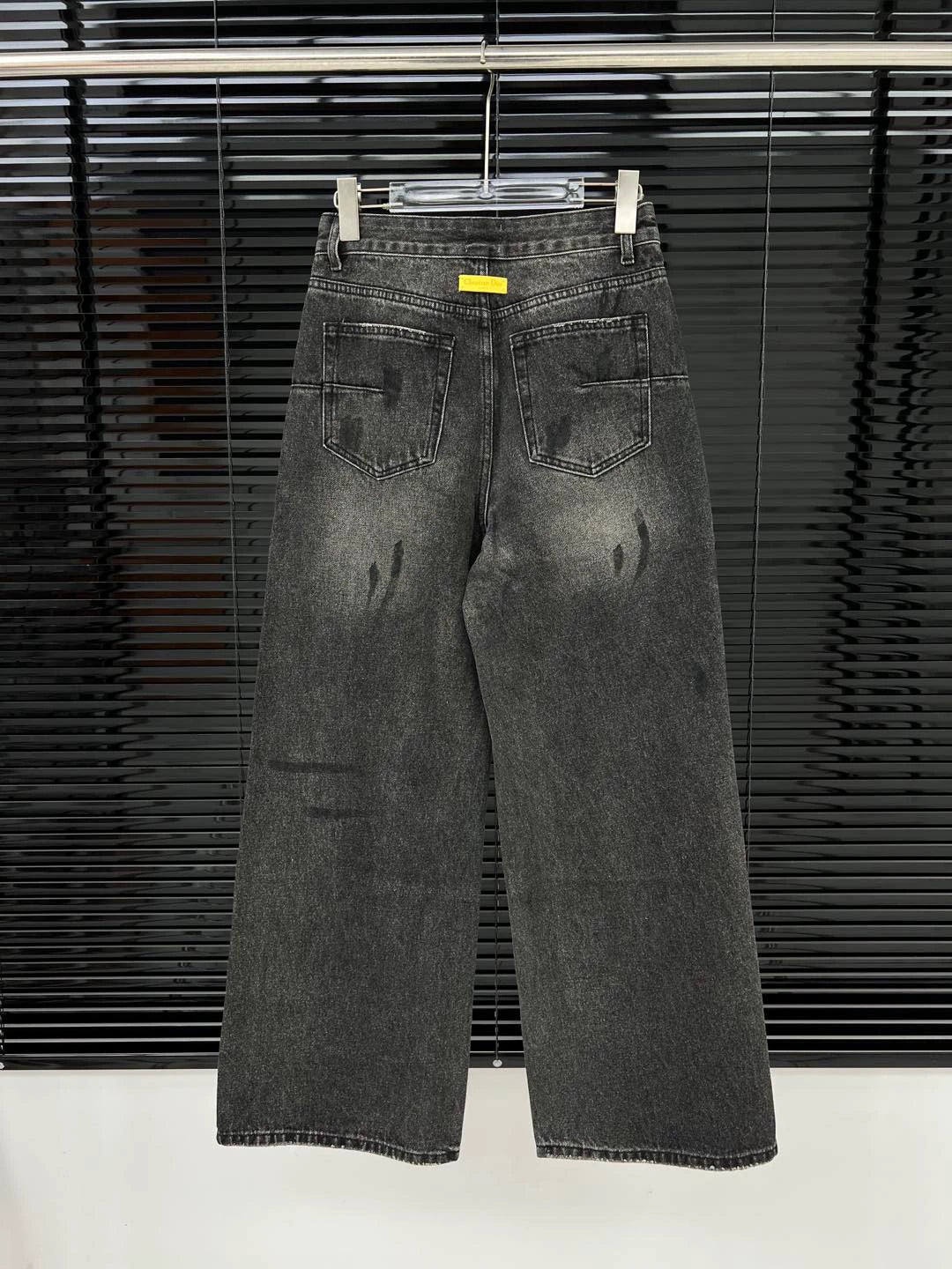 D 25 Ripped ink-splashed black and grey trousers Jeans
