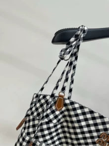 m 25 Summer new black and white checkered leather letter suspender skirt