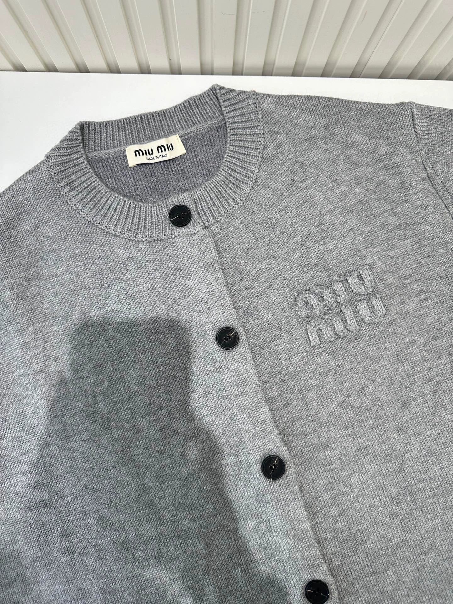 Mi 25 Crew-neck knitted cardigan with logo