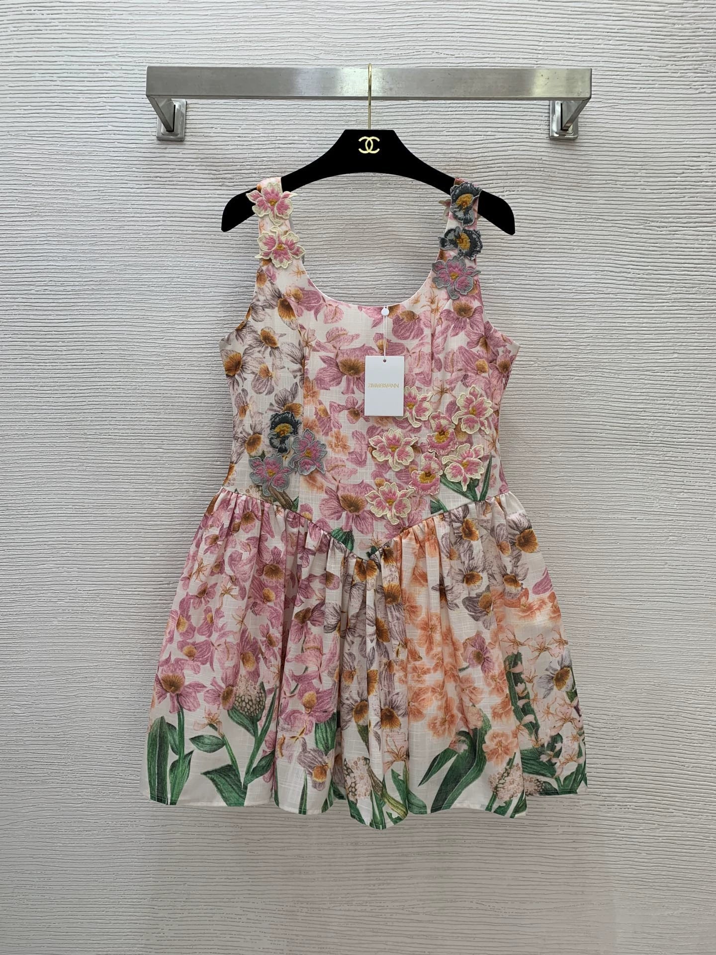V 25 New holiday-inspired sleeveless tank dress with a full skirt and a puffy hem!