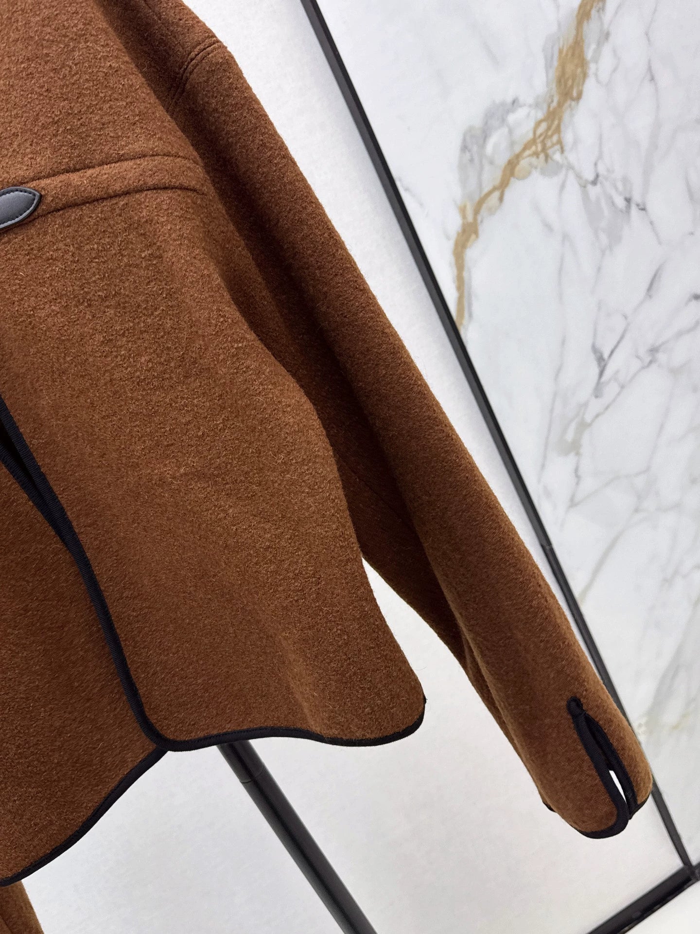 L 25 Leather buttoned cape coat