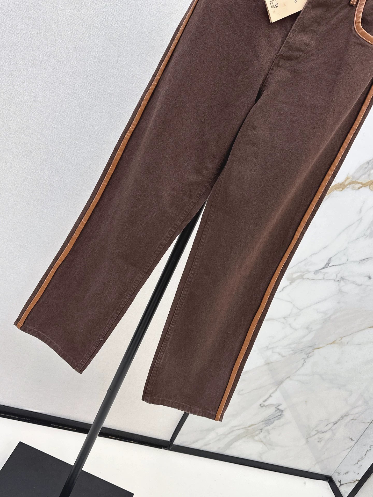 M 25 Brown jeans with leather detailing