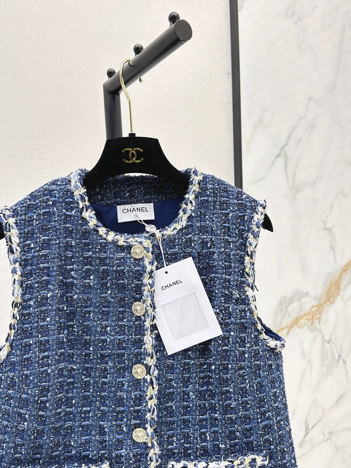 C 25 Model's sapphire blue tweed vest