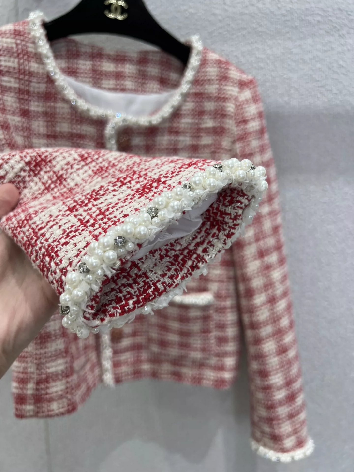 C 25 Red and white checked tweed jacket with beaded trim