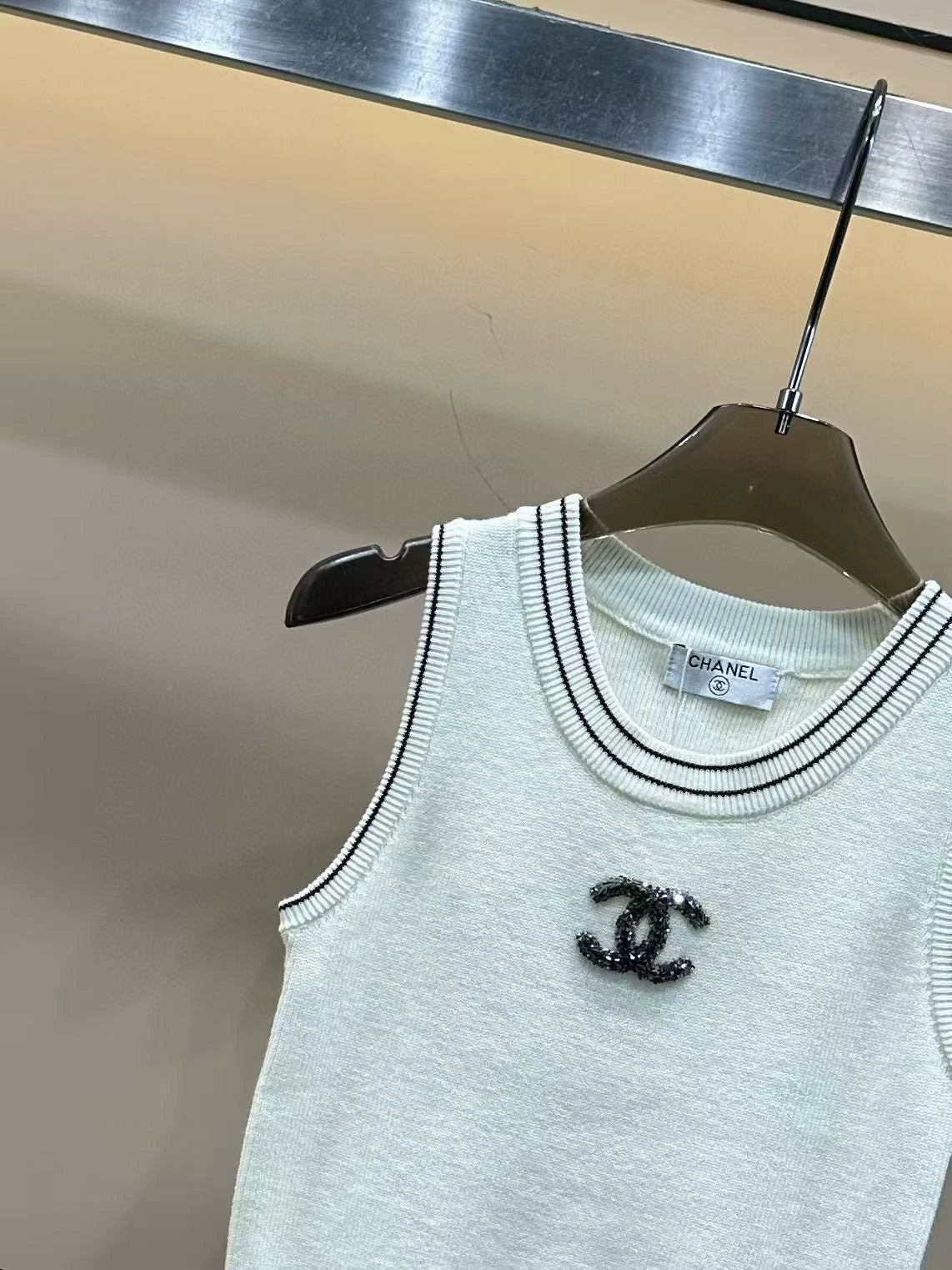 round neck vest with handmade beads on the chest