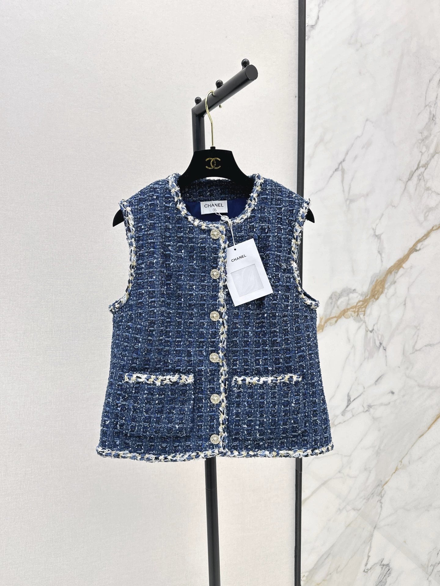 C 25 Model's sapphire blue tweed vest
