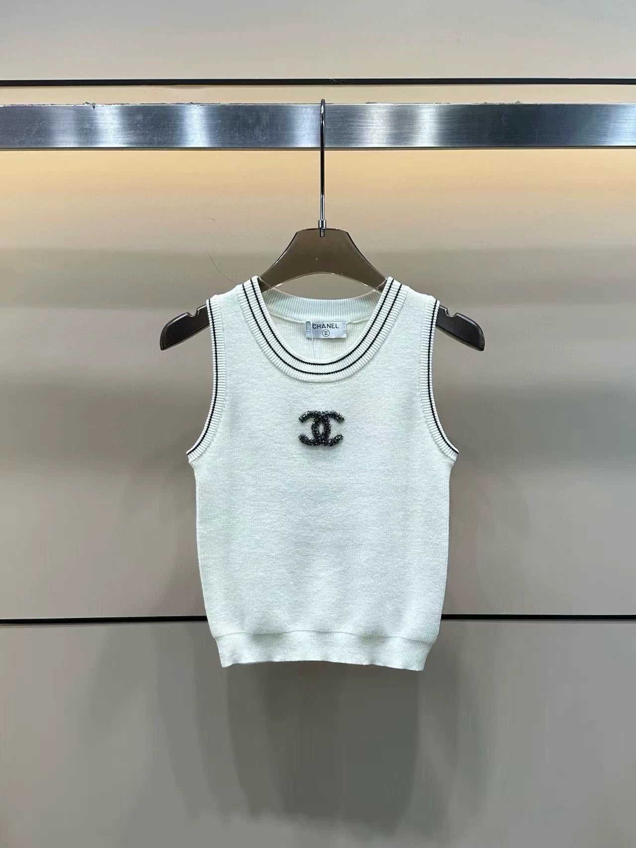 round neck vest with handmade beads on the chest