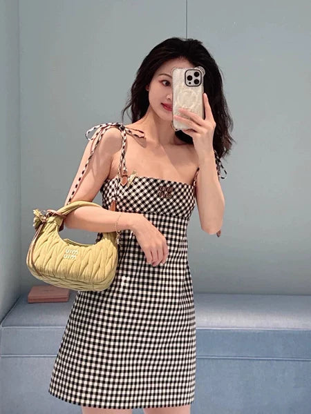 m 25 Summer new black and white checkered leather letter suspender skirt