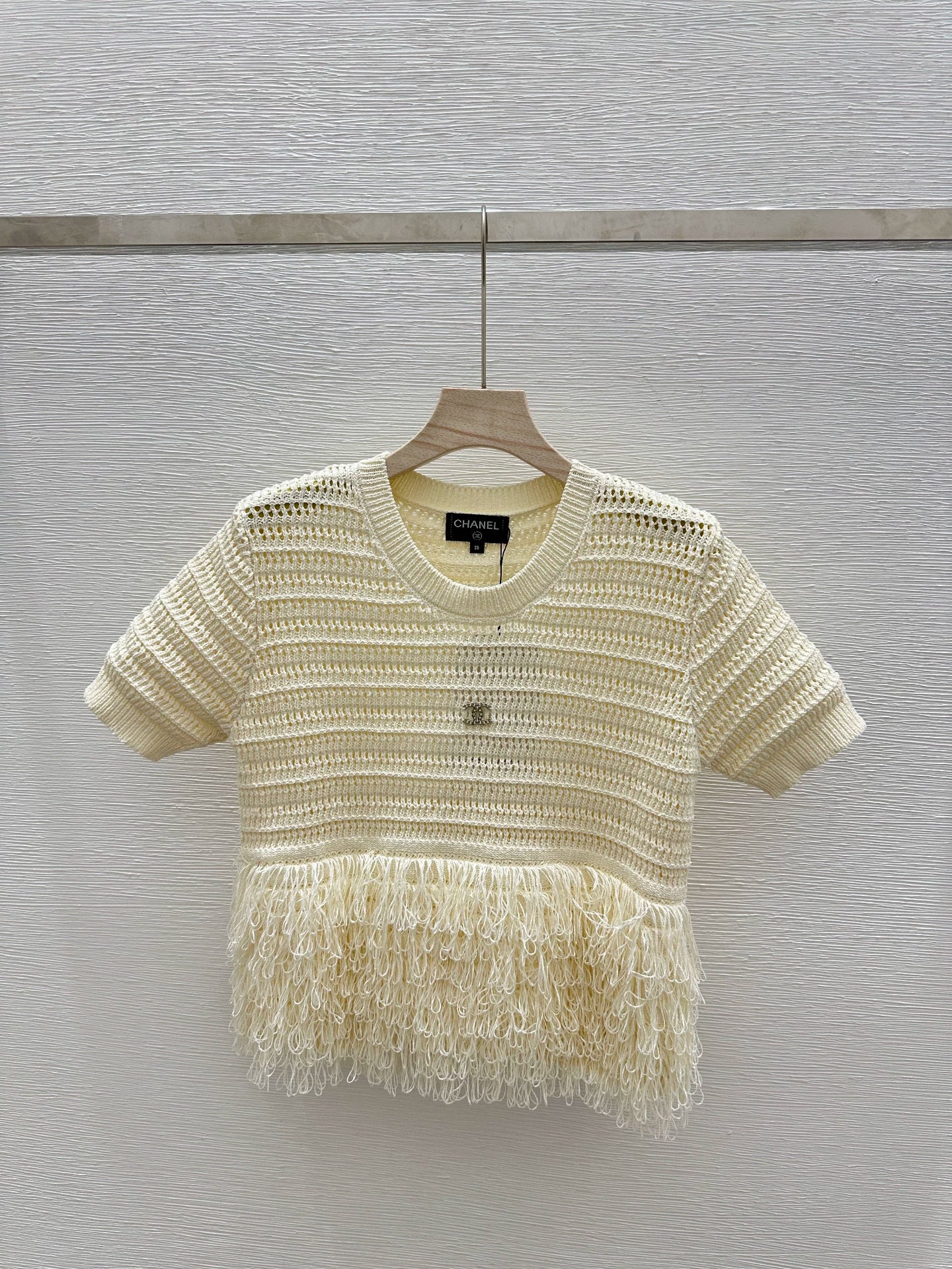 25 New Cutout Knit Splicing Tassel Metal Logo Vest