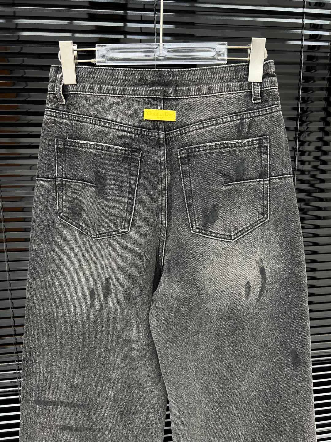 D 25 Ripped ink-splashed black and grey trousers Jeans