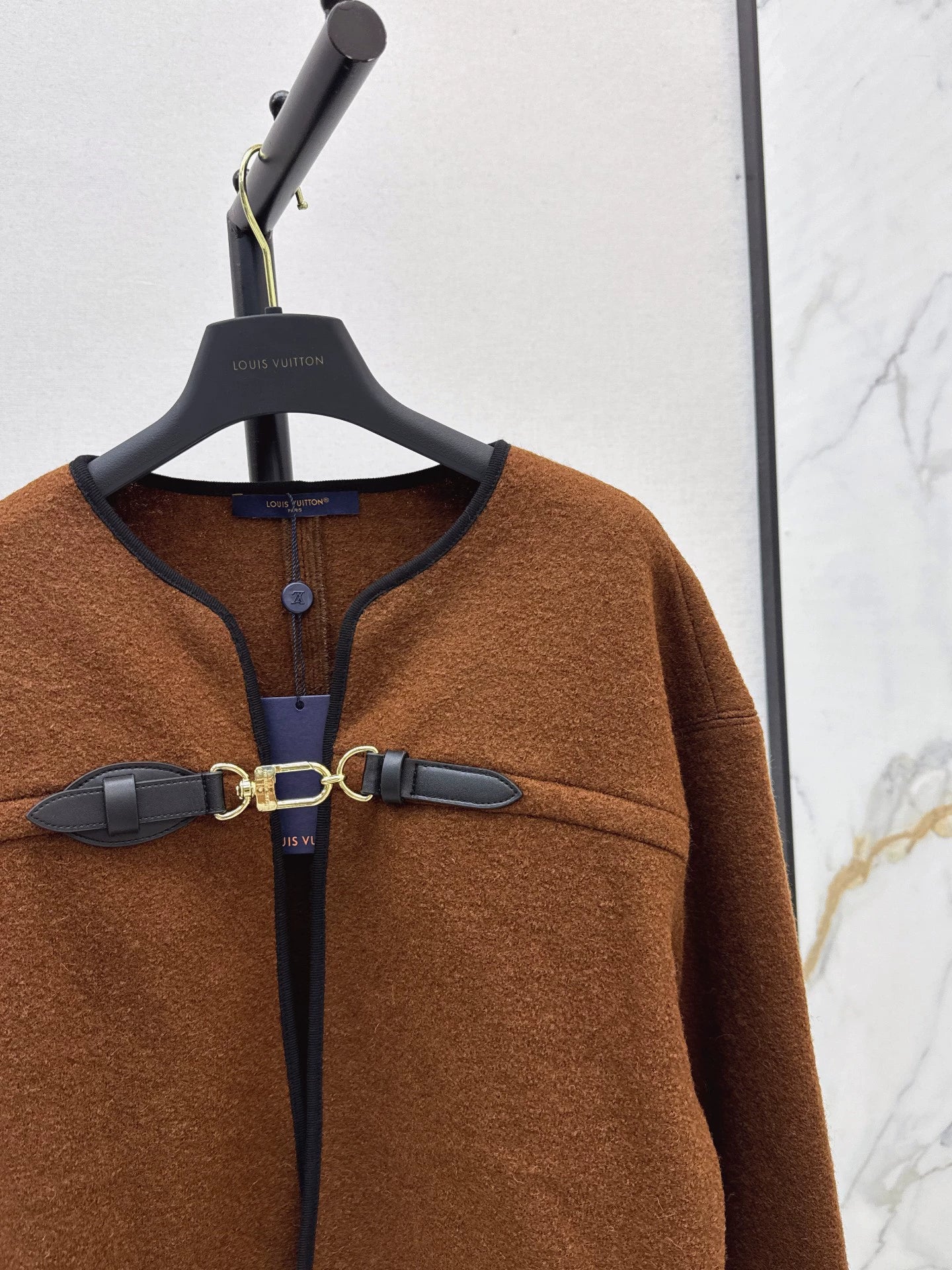 L 25 Leather buttoned cape coat