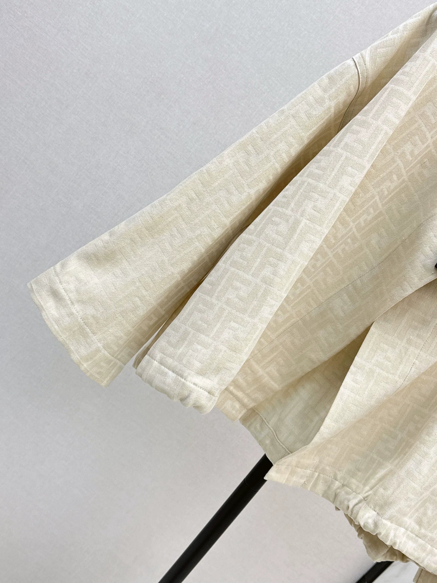 Fe 25 letter print cape coat
