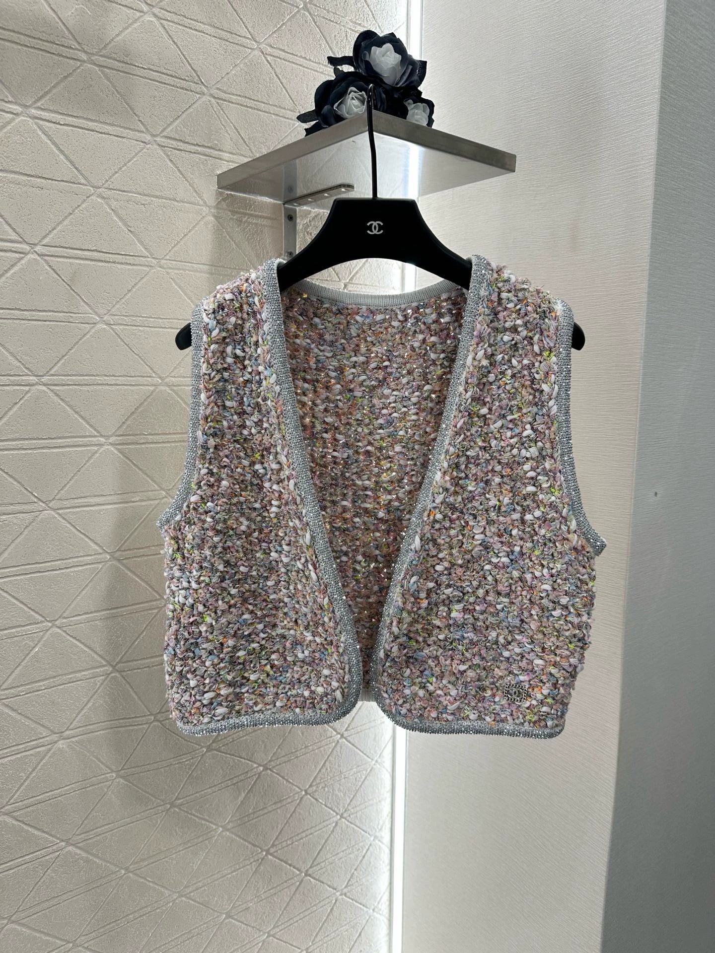 C 25 Knitted dress, vest, and skirt set.