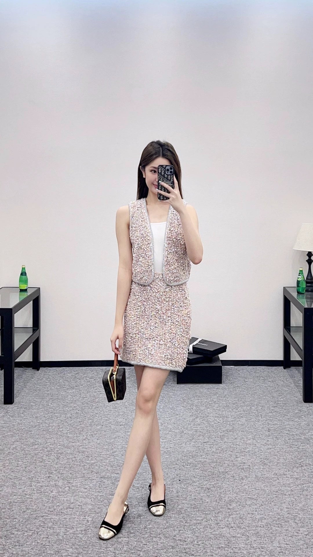 C 25 Knitted tweed cardigan and skirt set
