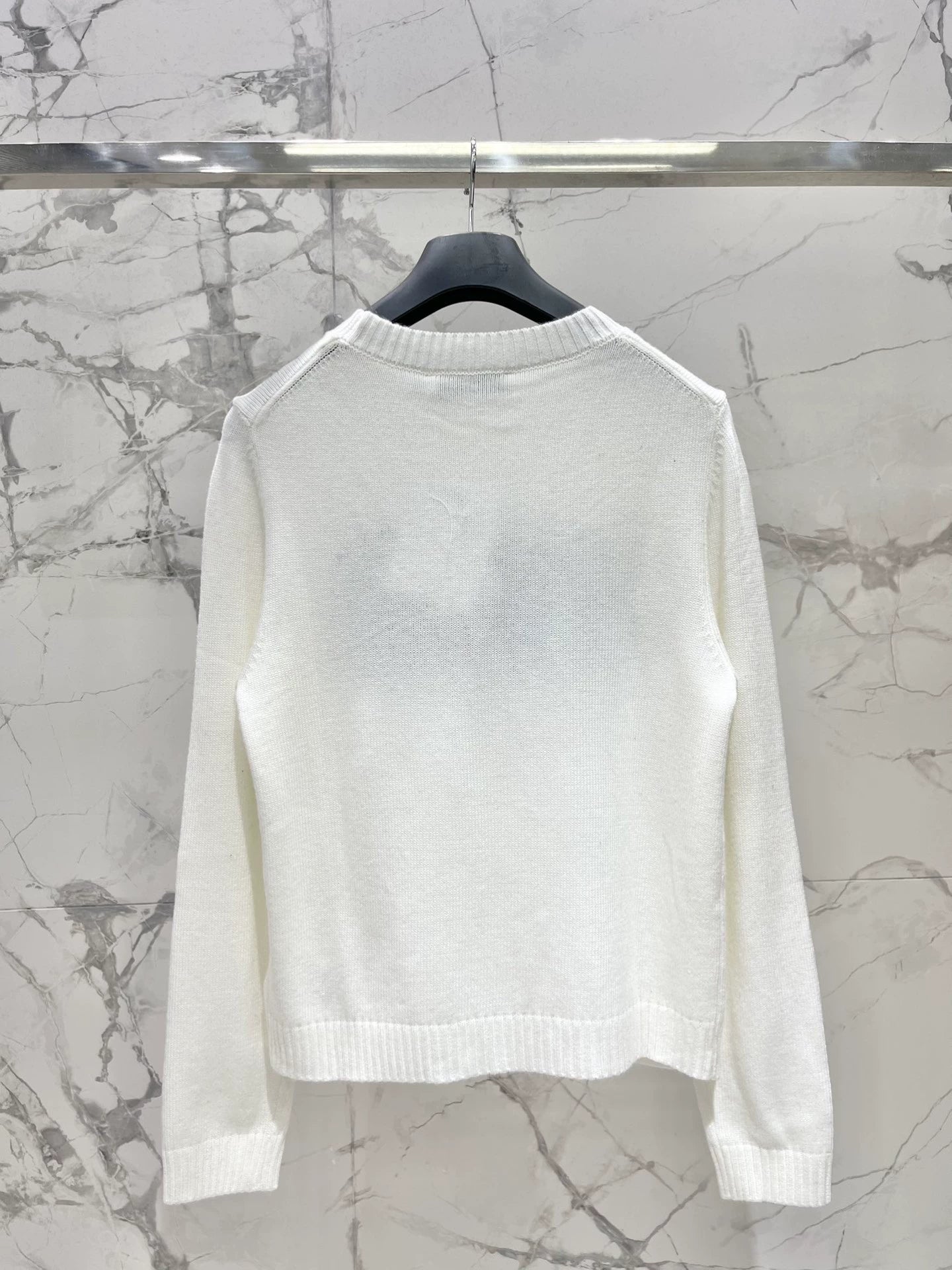 D 25 New letter-print cashmere and wool sweater.