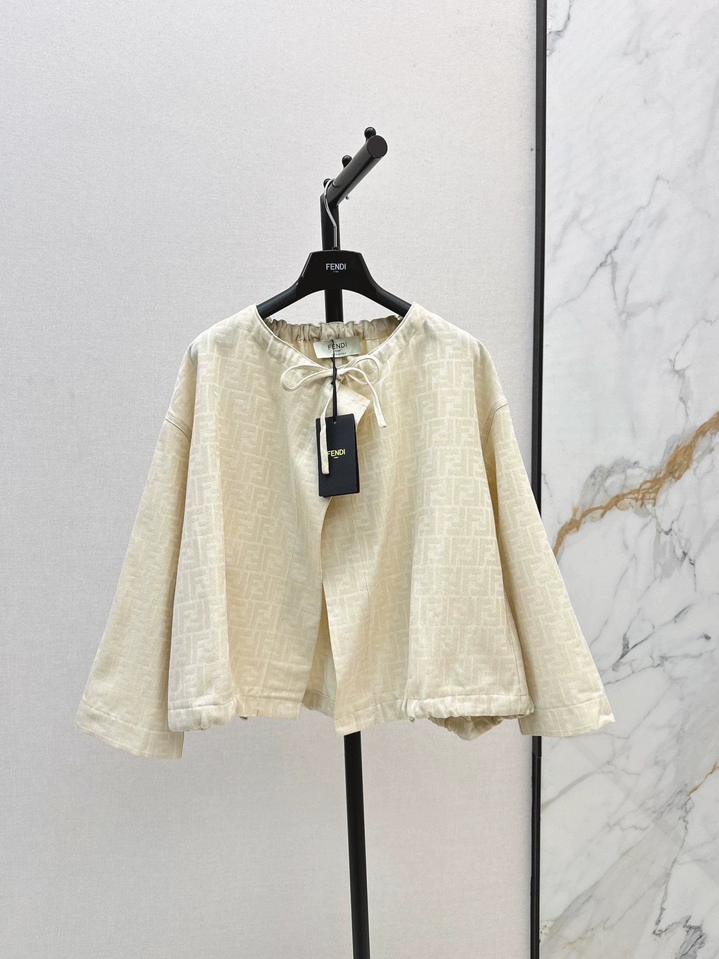 Fe 25 letter print cape coat