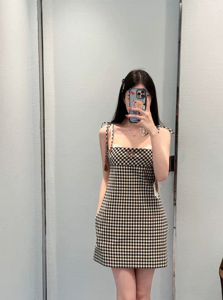 m 25 Summer new black and white checkered leather letter suspender skirt