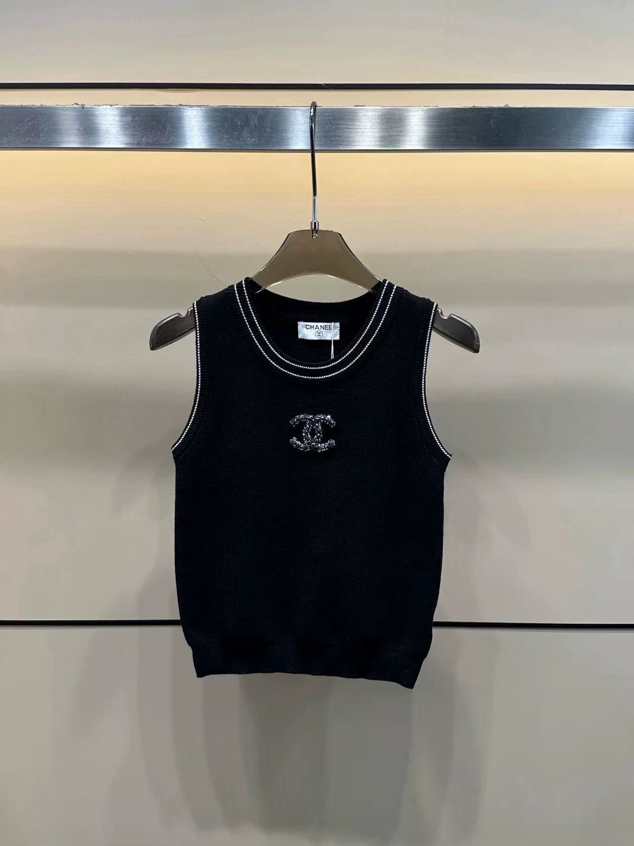 round neck vest with handmade beads on the chest