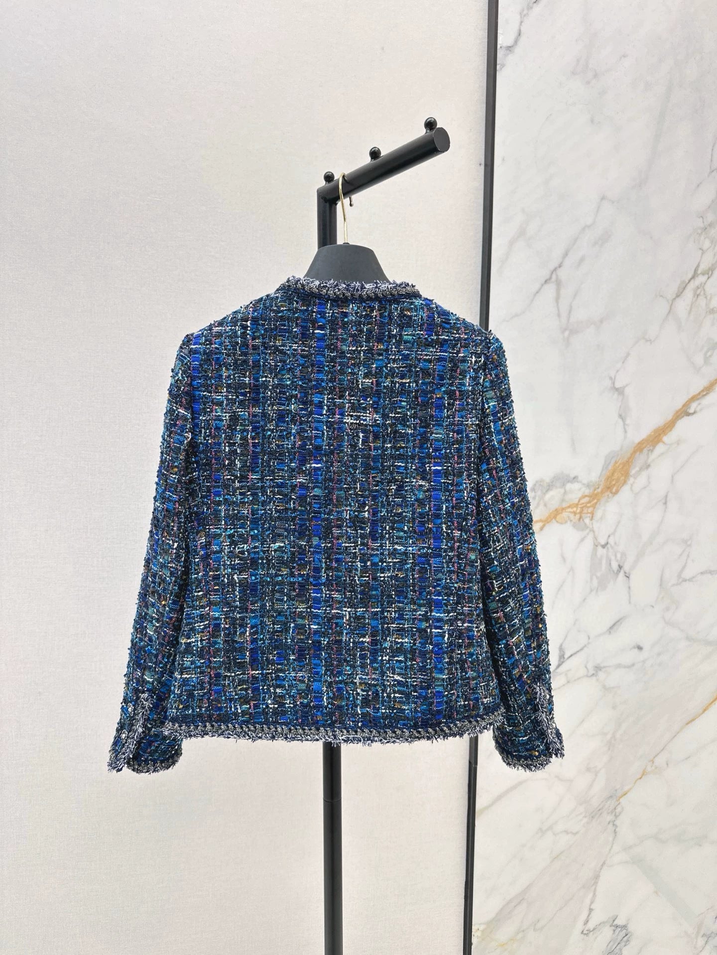 He 25 Tweed jacket with trim