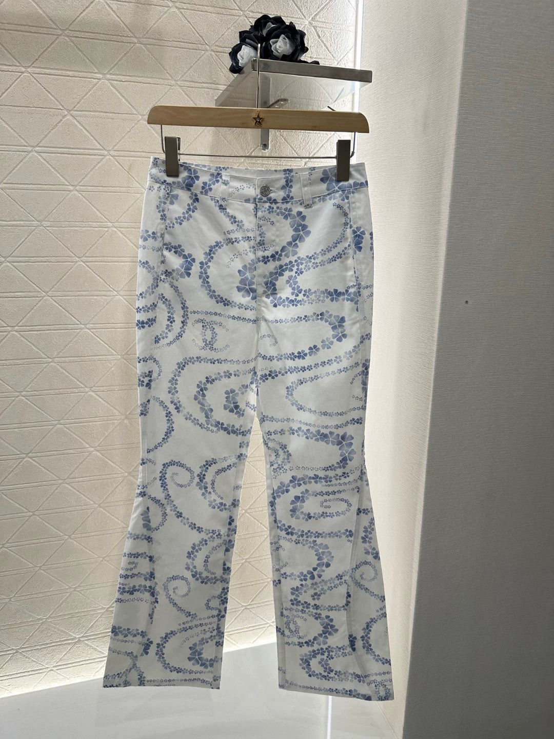 C 25 new products on the shelves Slightly flared printed denim trousers