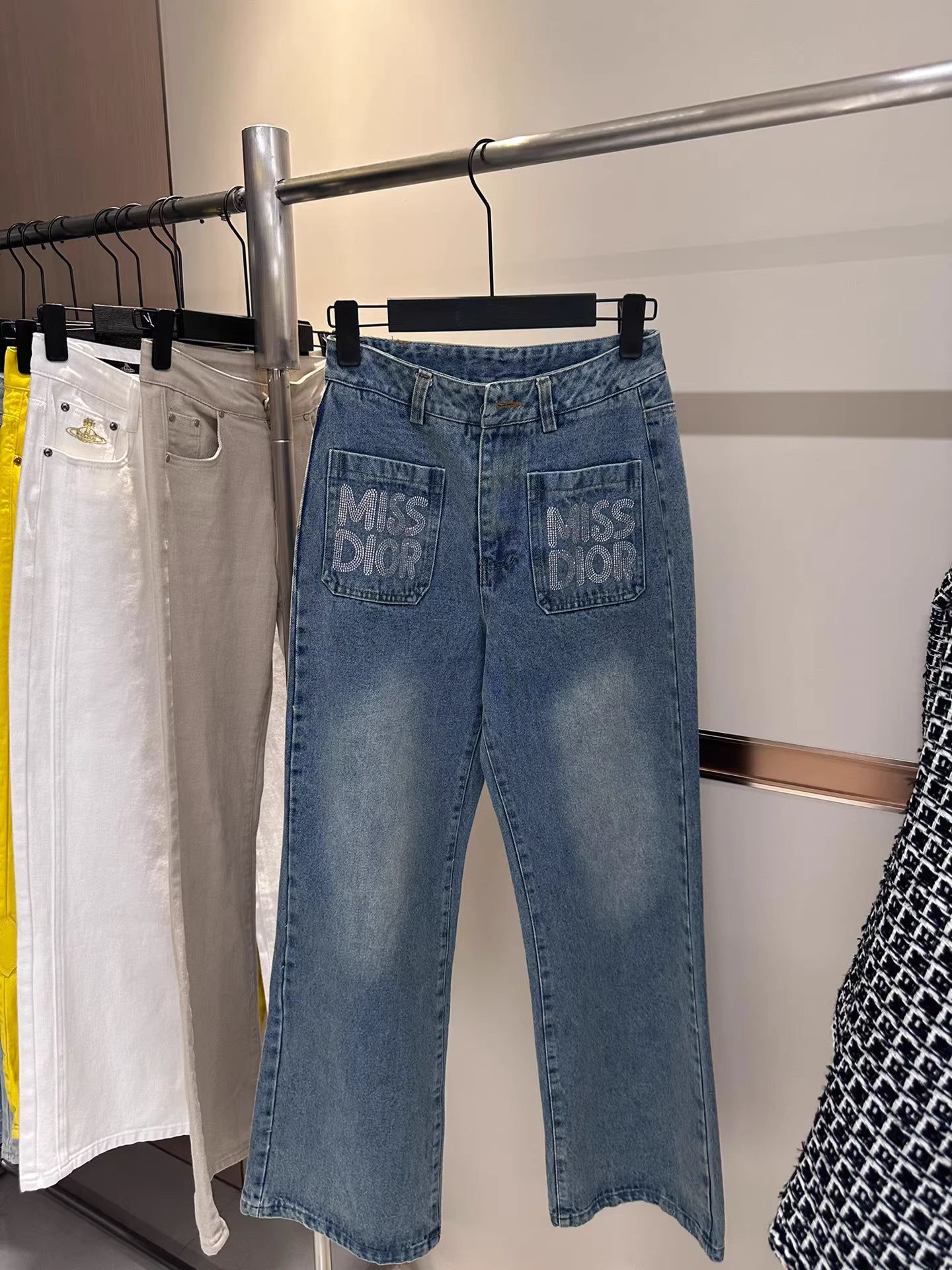 D 25 Jeans with rhinestone front pockets