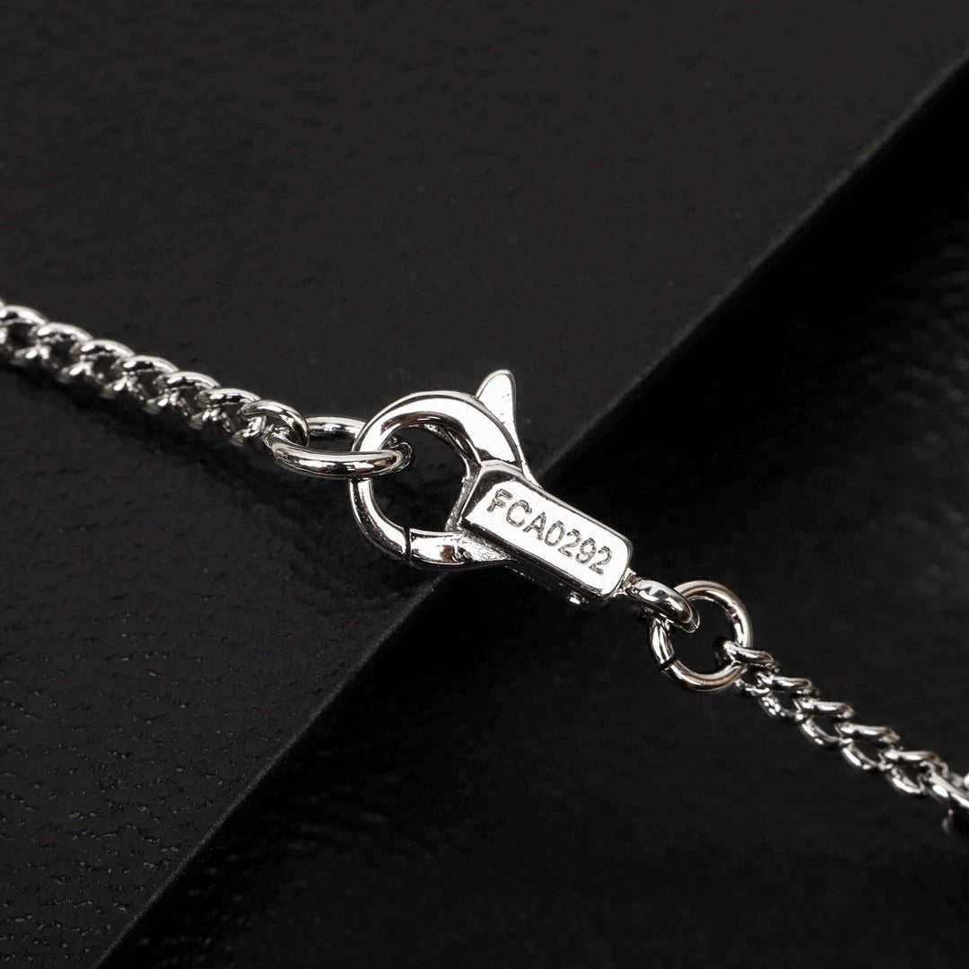 CE 25 Gold necklace with full diamond logo and Arc de Triomphe logo
