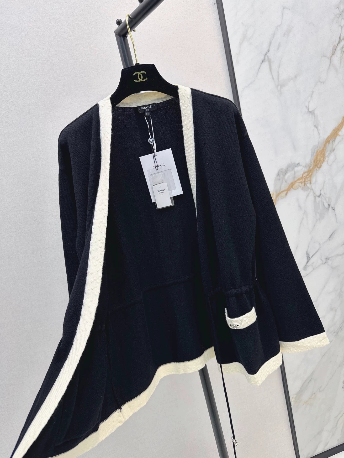 C 25 Black and white contrast knitted wool cardigan