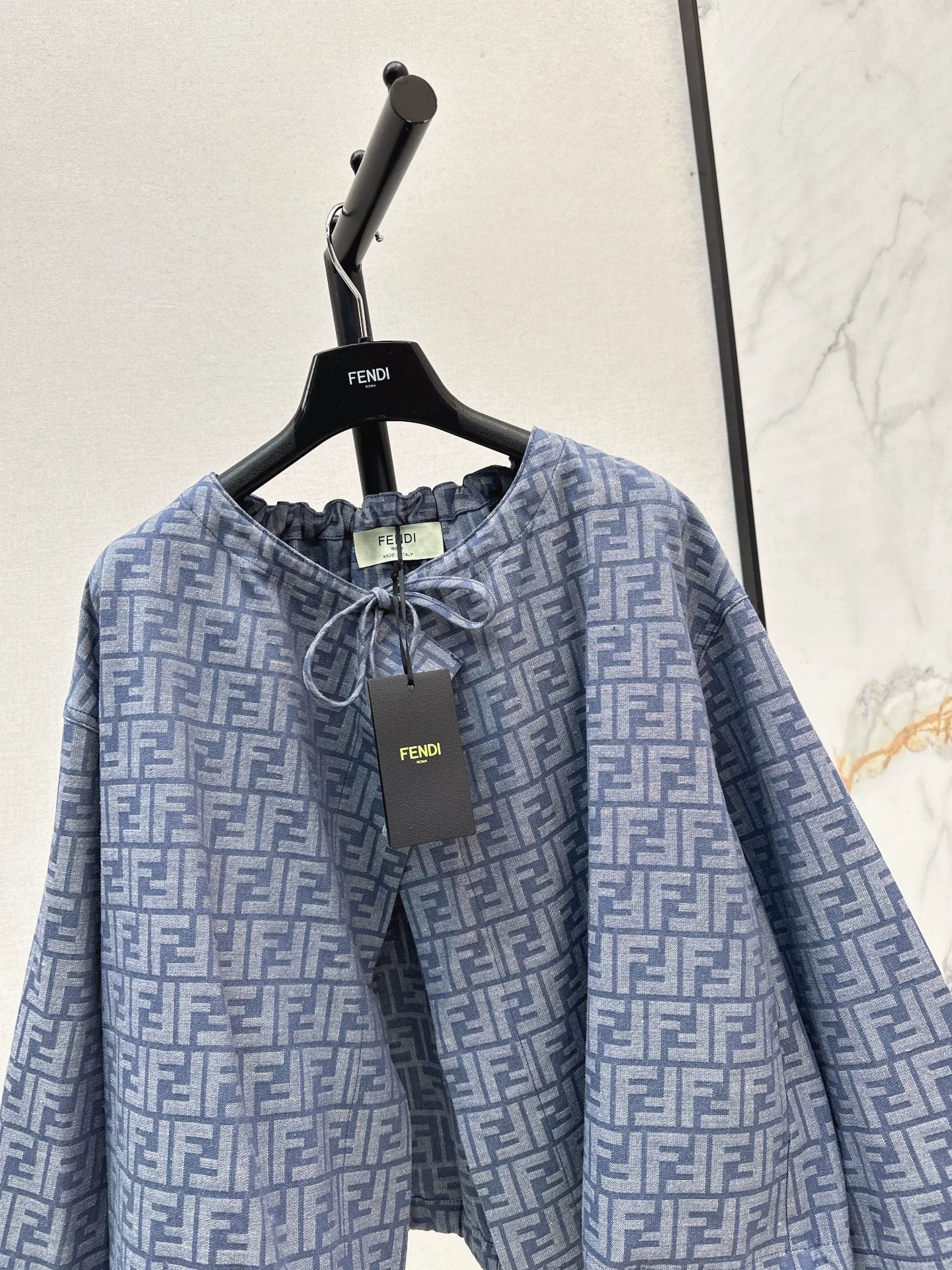 Fe 25 letter print cape coat