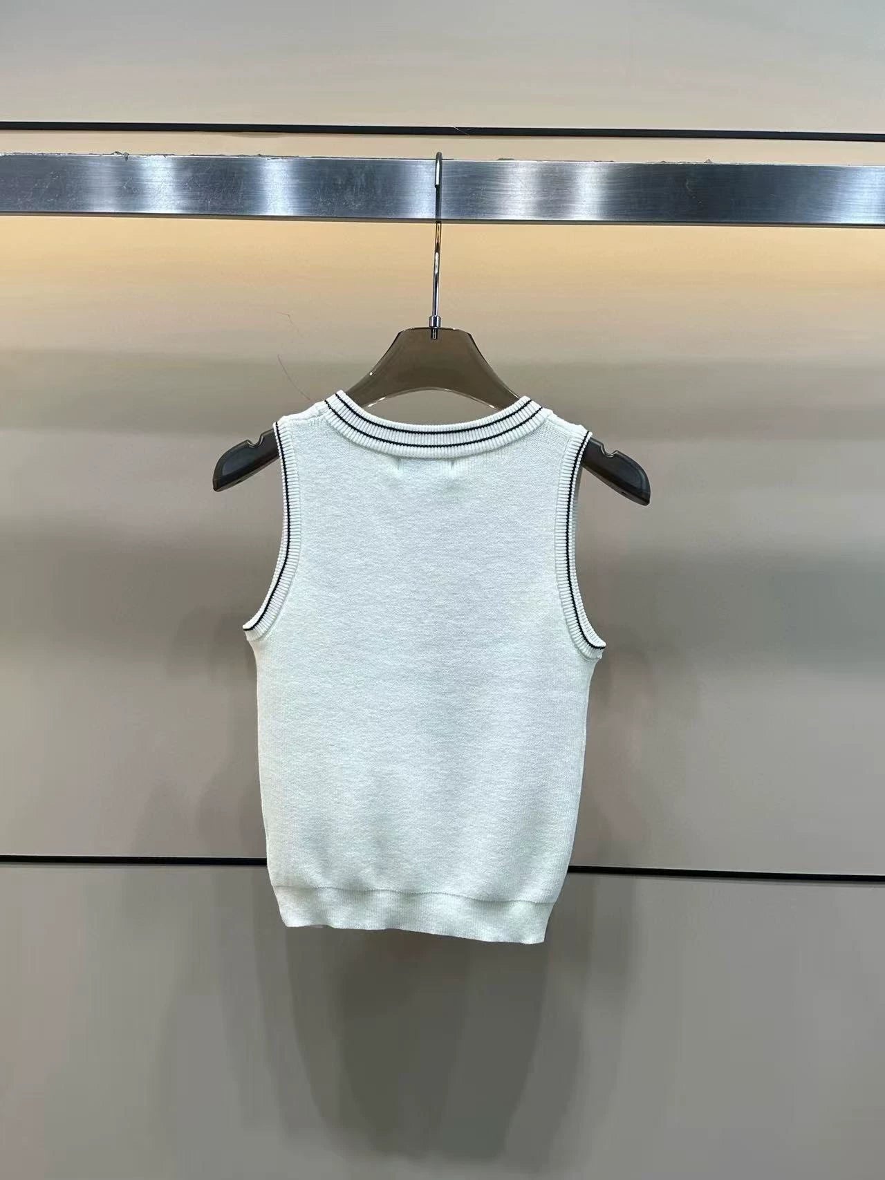 round neck vest with handmade beads on the chest