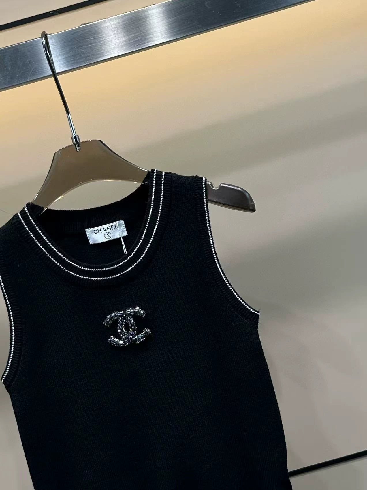 round neck vest with handmade beads on the chest