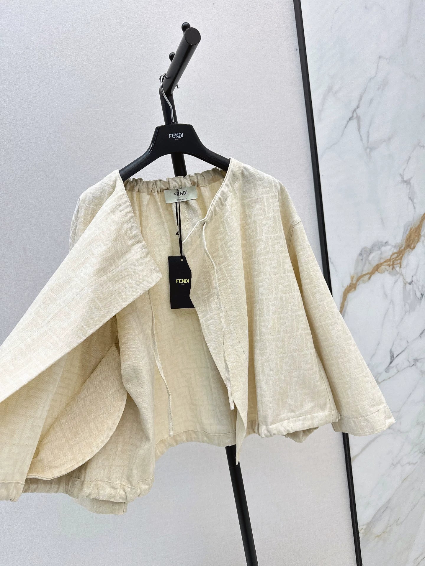 Fe 25 letter print cape coat