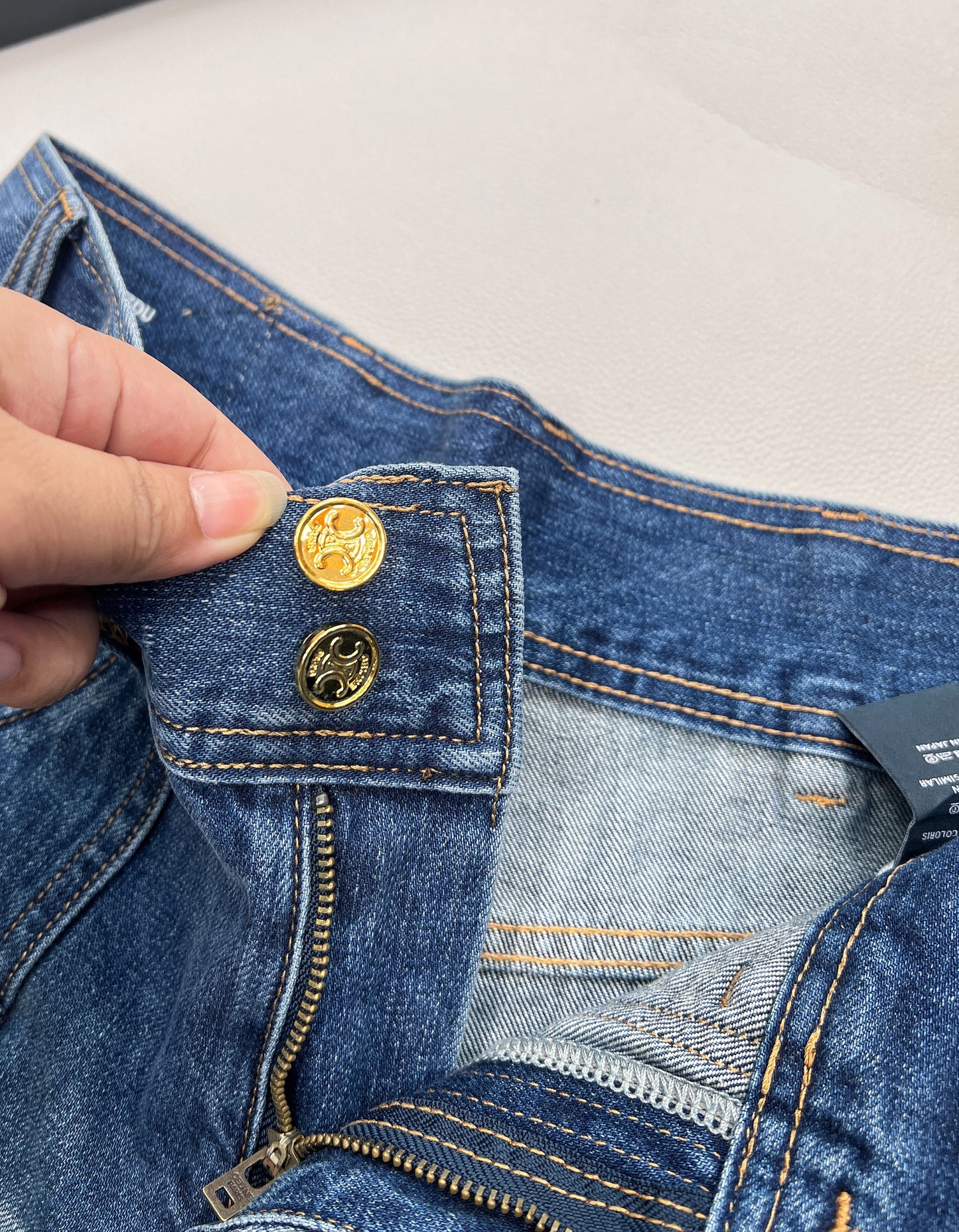 CE 25 Sommer neues Produkt blau hohe Taille Gürtelschlaufe Taschendekoration Jeans-Shorts
