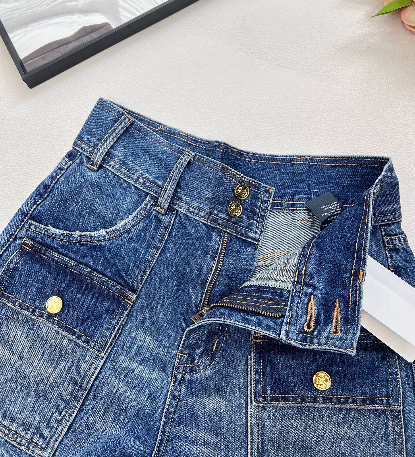 CE 25 Sommer neues Produkt blau hohe Taille Gürtelschlaufe Taschendekoration Jeans-Shorts