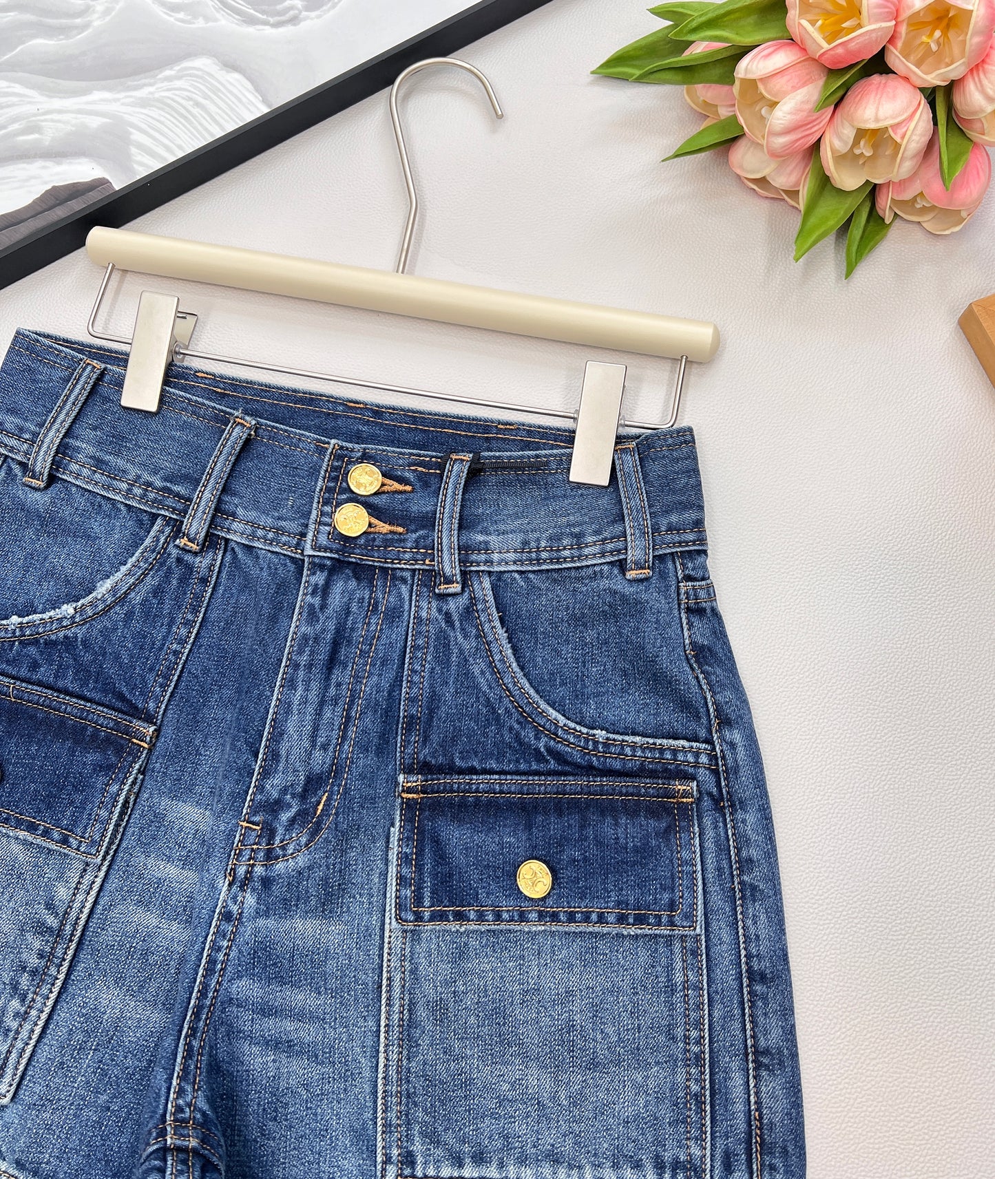 CE 25 Sommer neues Produkt blau hohe Taille Gürtelschlaufe Taschendekoration Jeans-Shorts