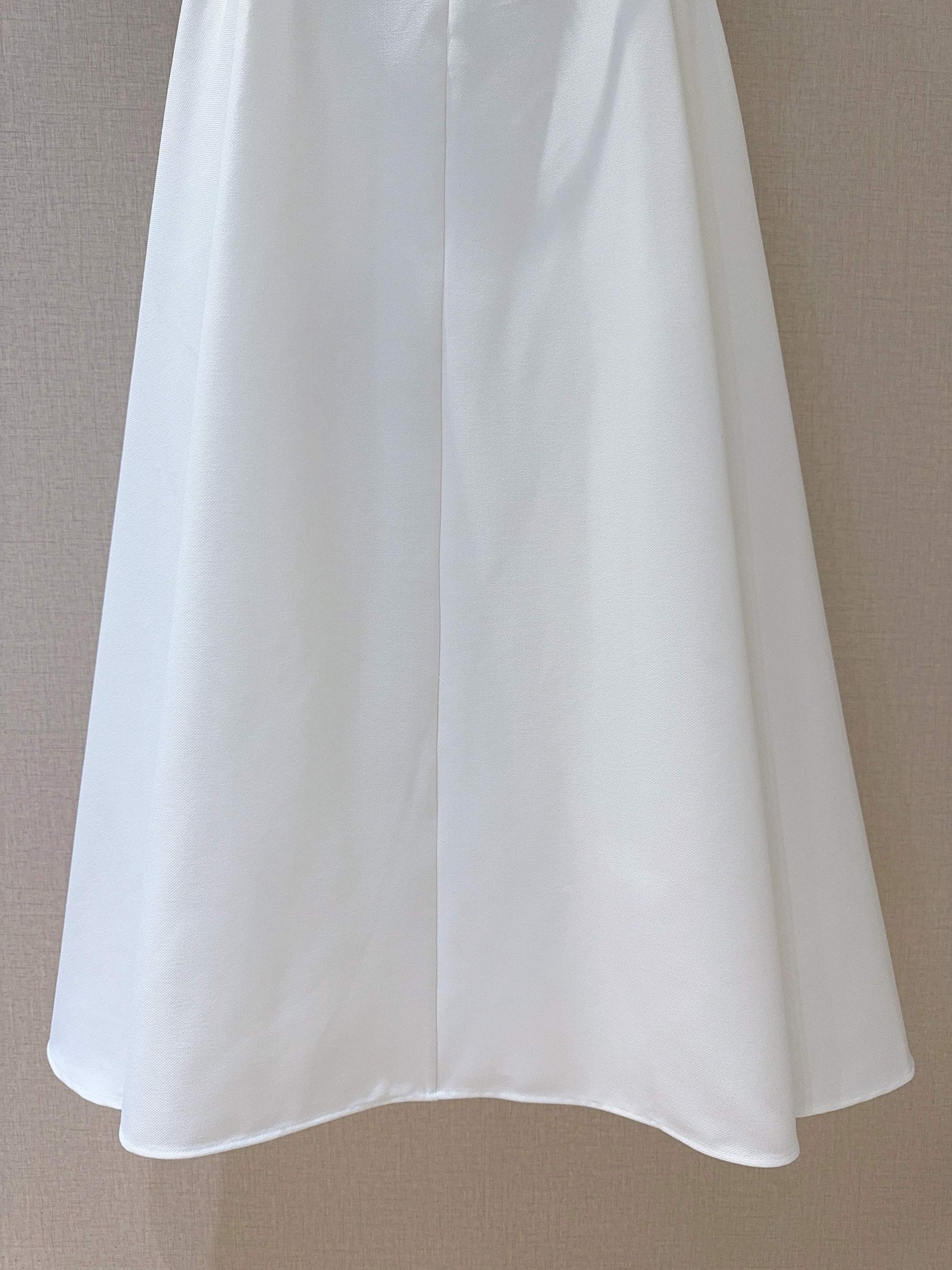 D 25 Mid-length with belt skirt
