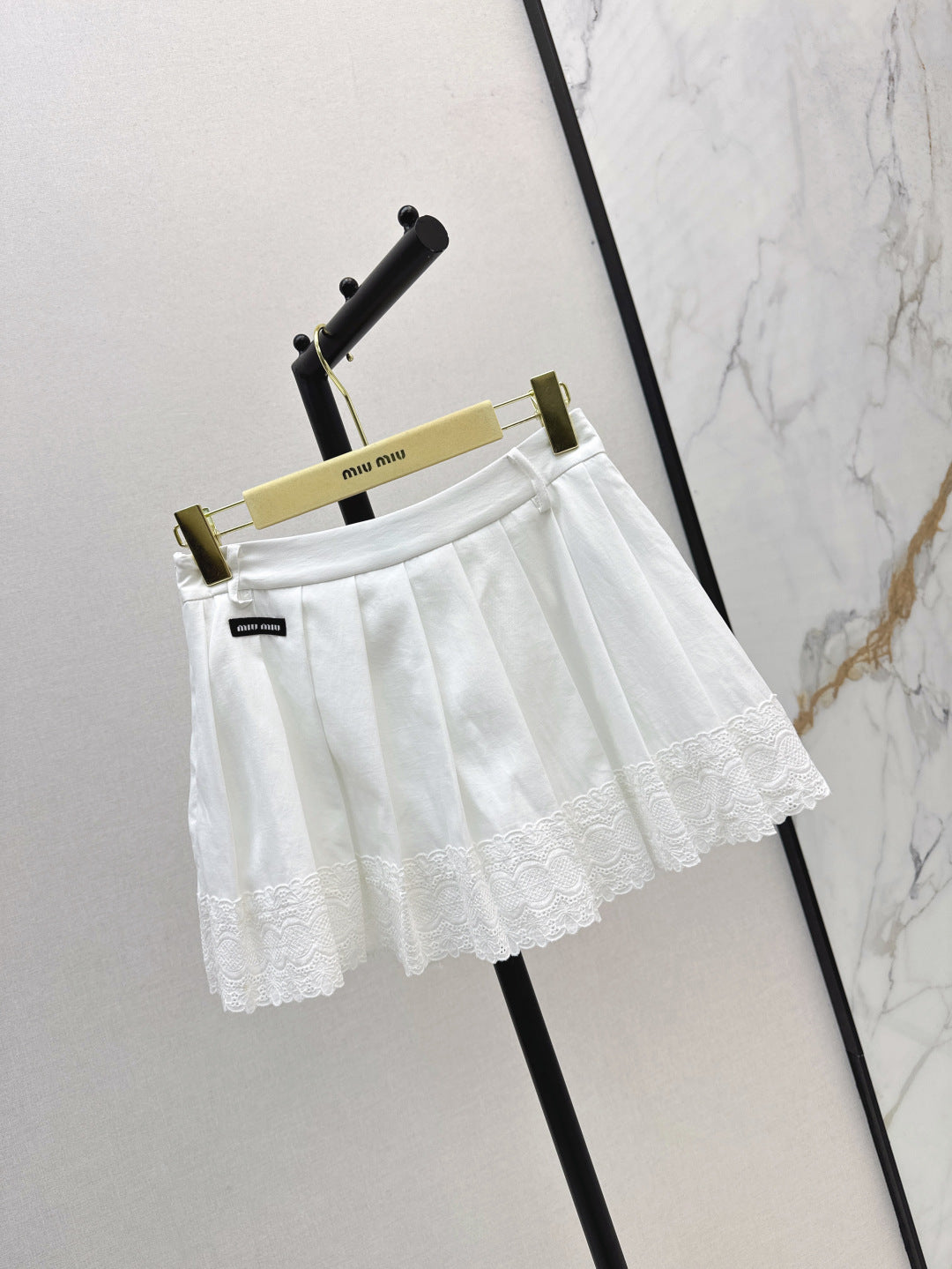 M 25fw pleated skirt