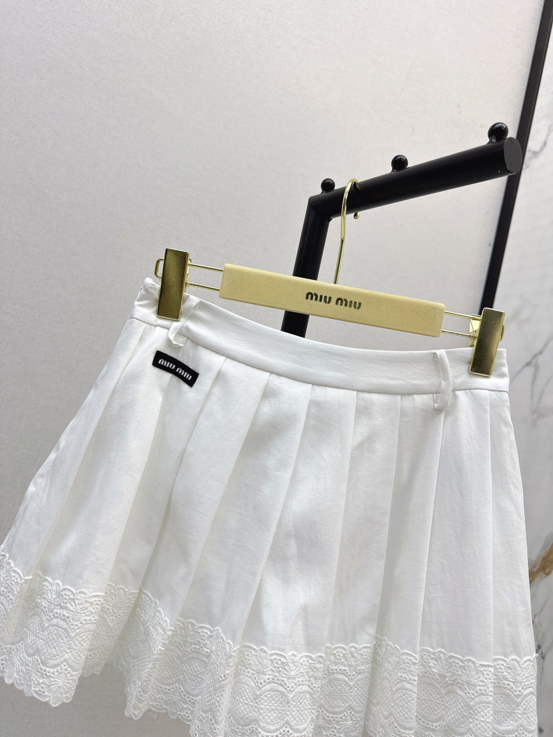M 25fw pleated skirt