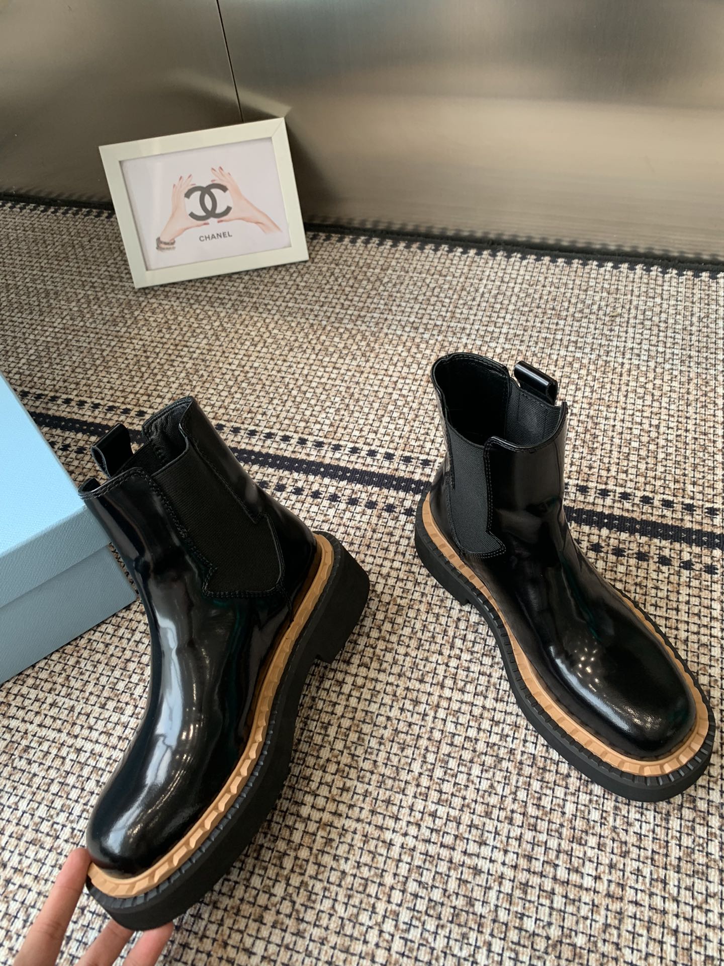 Pra 25fw Classic triangle ankle boots in shiny black