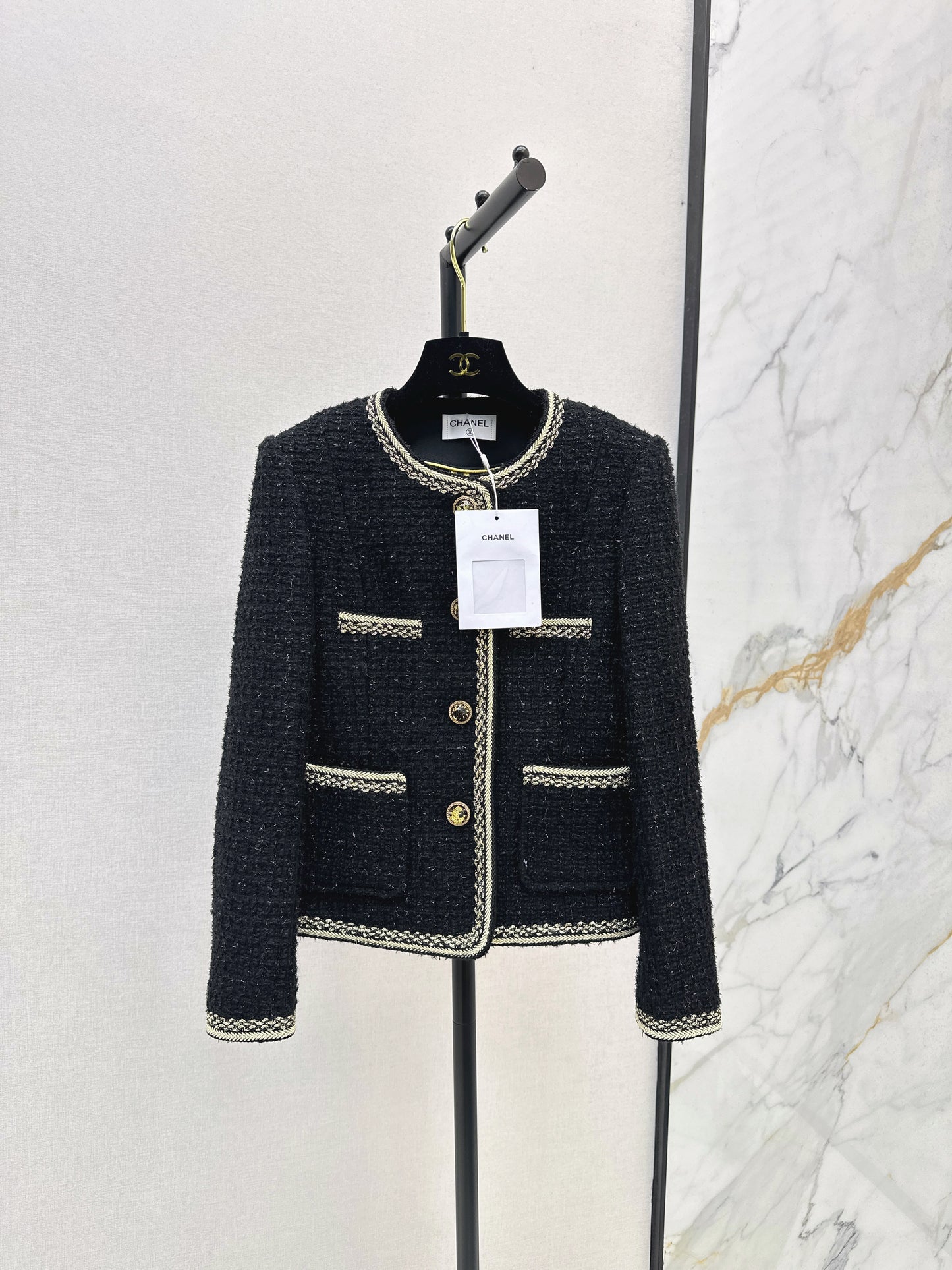 C 25 Trimmed tweed jacket
