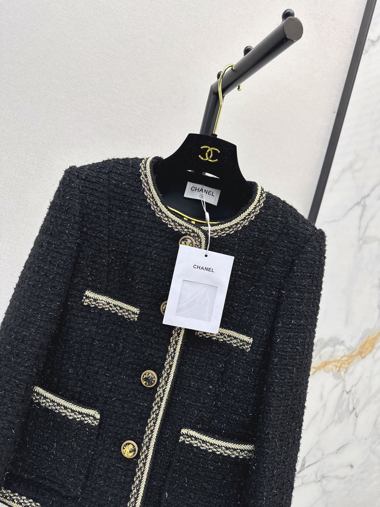 C 25 Trimmed tweed jacket