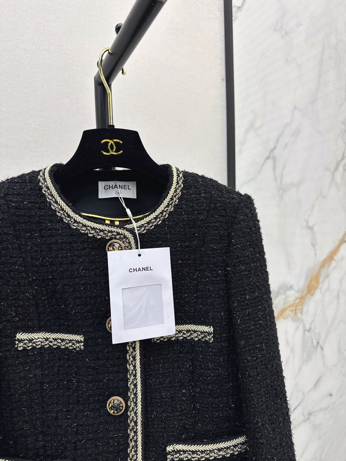 C 25 Trimmed tweed jacket