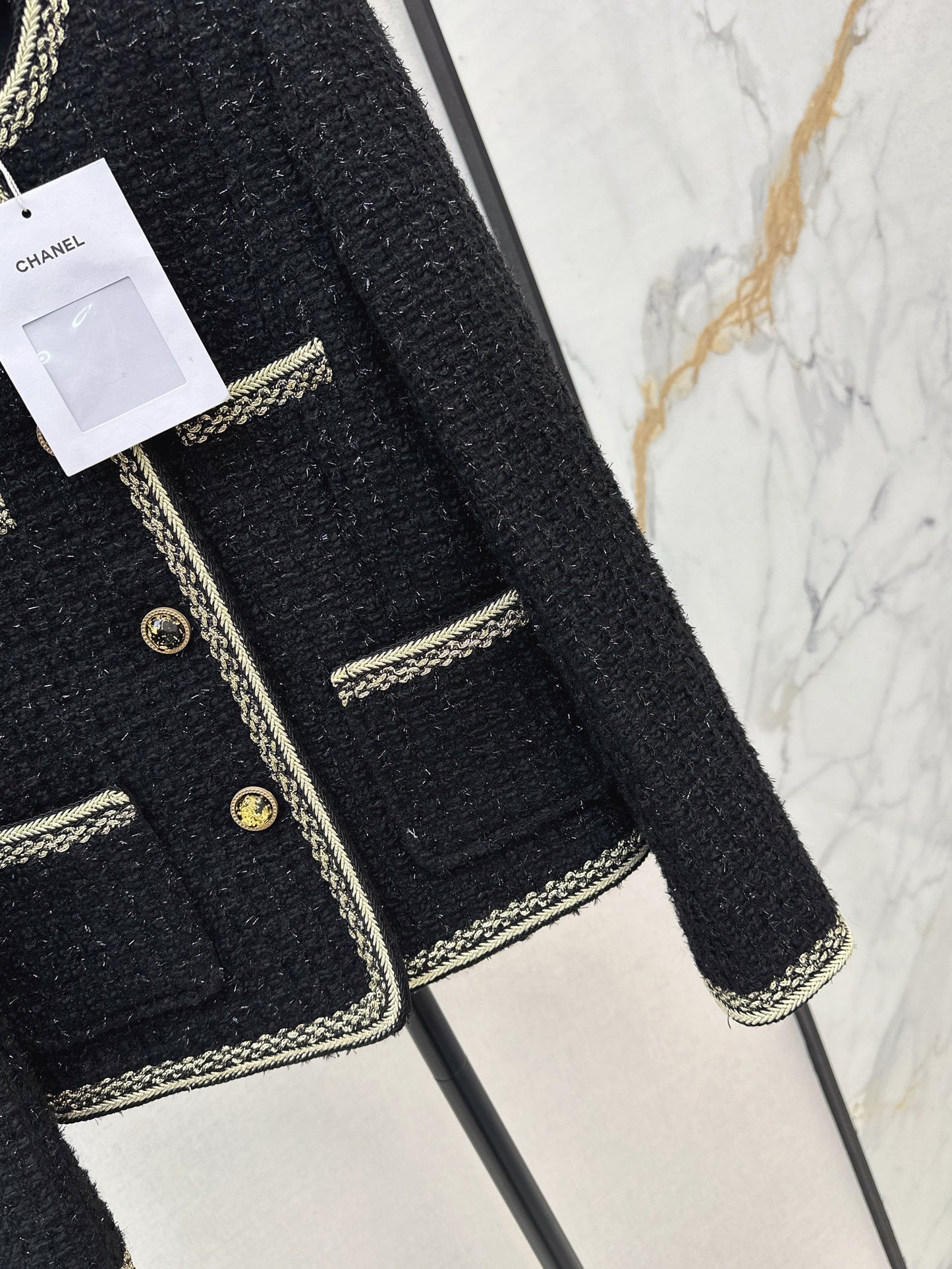 C 25 Trimmed tweed jacket