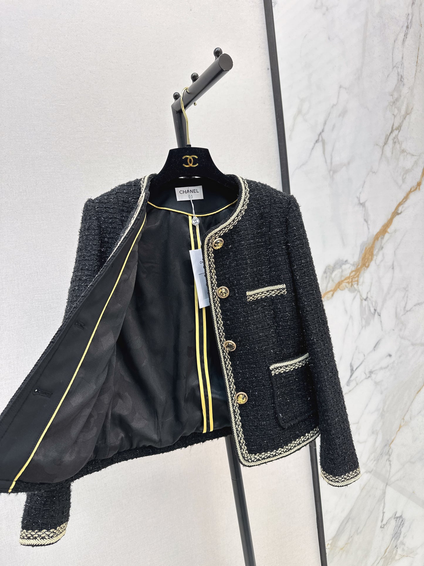 C 25 Trimmed tweed jacket