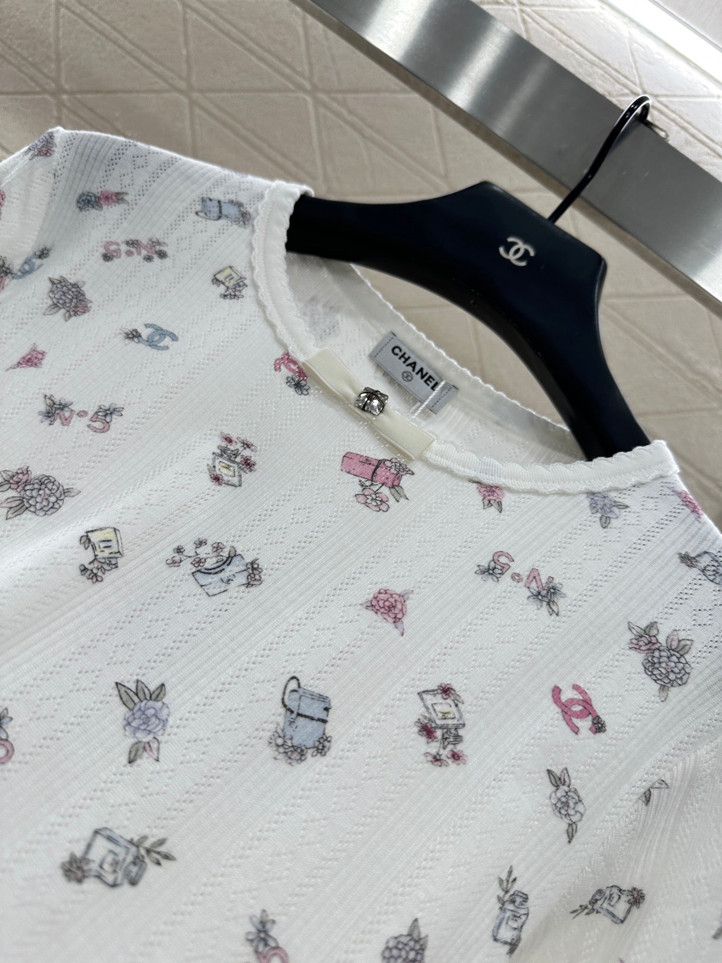 C 25 Printed bow decoration long sleeves