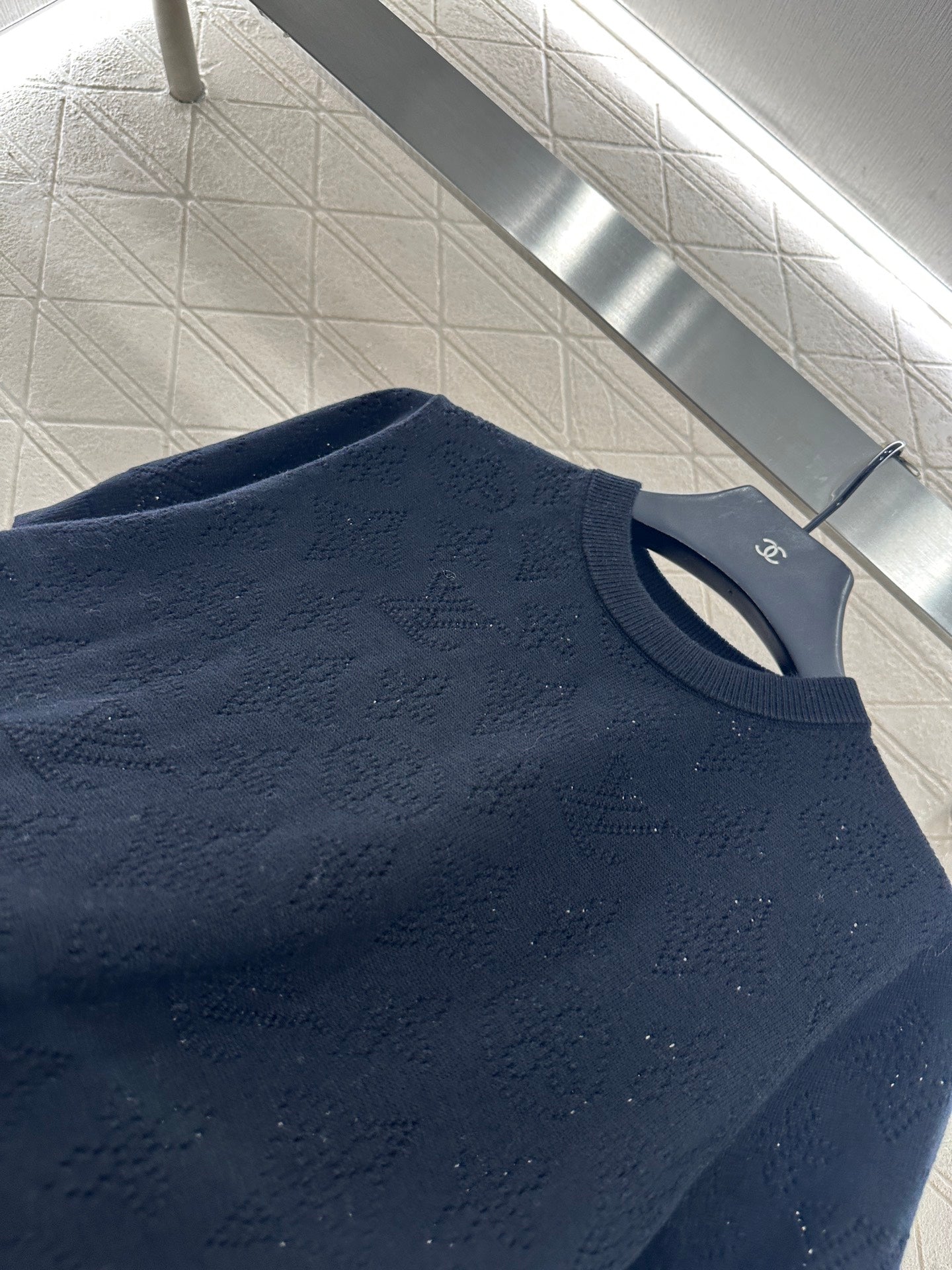 L 25 Hollow logo wool knitted short sleeved shirt